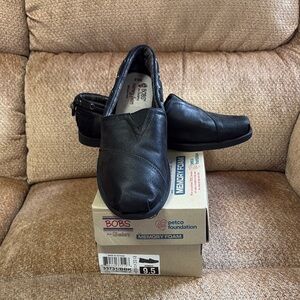 Skechers BOBS women’s Black Slip-On Shoes